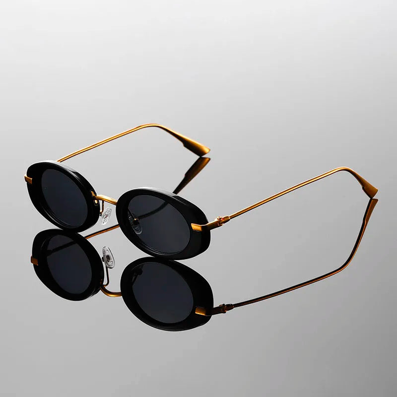 Orla Lunettes de Soleil Micro Oval Verres Petits Protection UV Totale Bras Doré Léger Silhouette Rétro Minimaliste