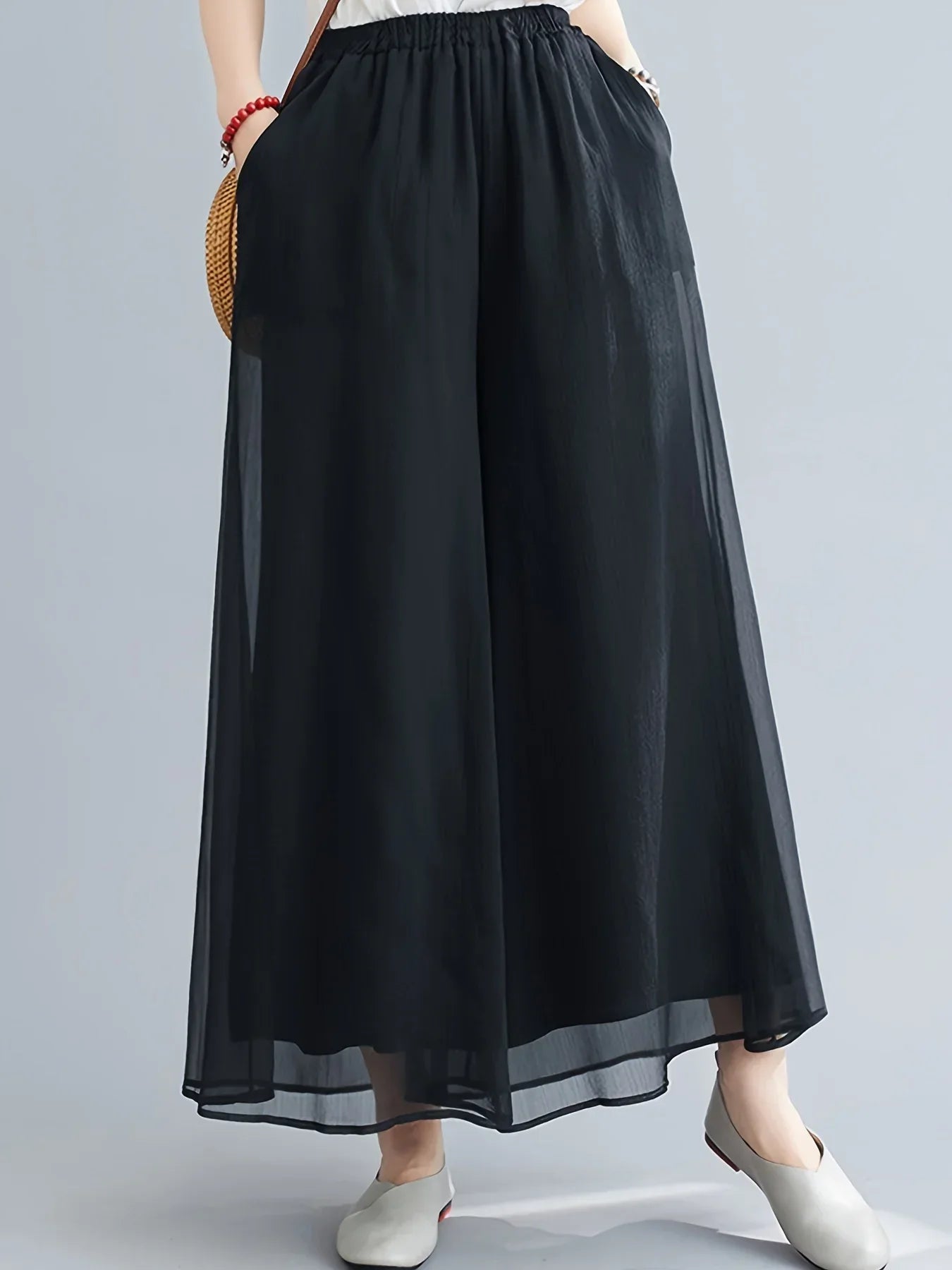 Pantalon En Mousseline Voilée Double Couche Avec Ourlet Diaphane Et Évasé Fluide Jusqu A La Cheville