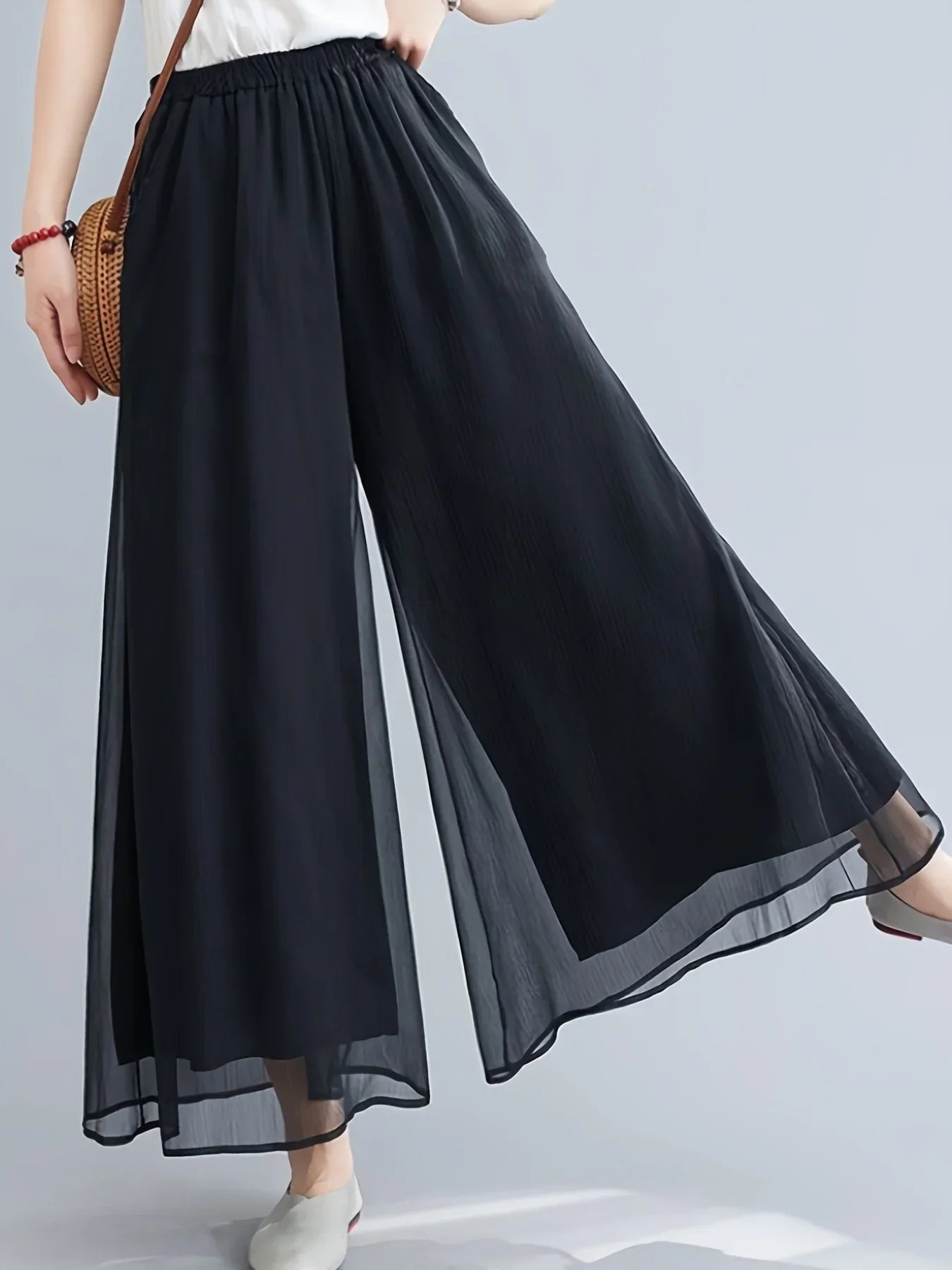 Pantalon En Mousseline Voilée Double Couche Avec Ourlet Diaphane Et Évasé Fluide Jusqu A La Cheville