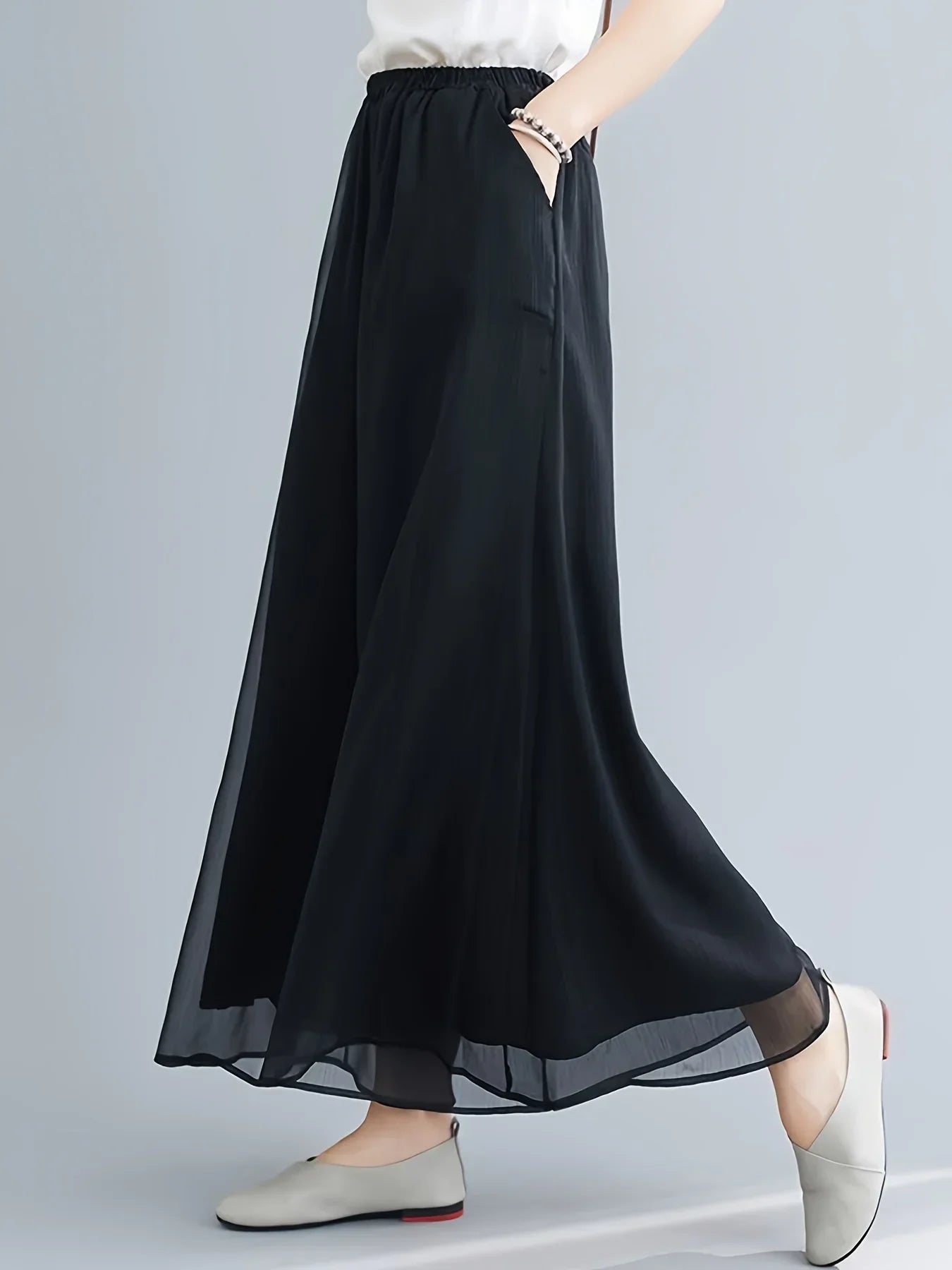 Pantalon En Mousseline Voilée Double Couche Avec Ourlet Diaphane Et Évasé Fluide Jusqu A La Cheville