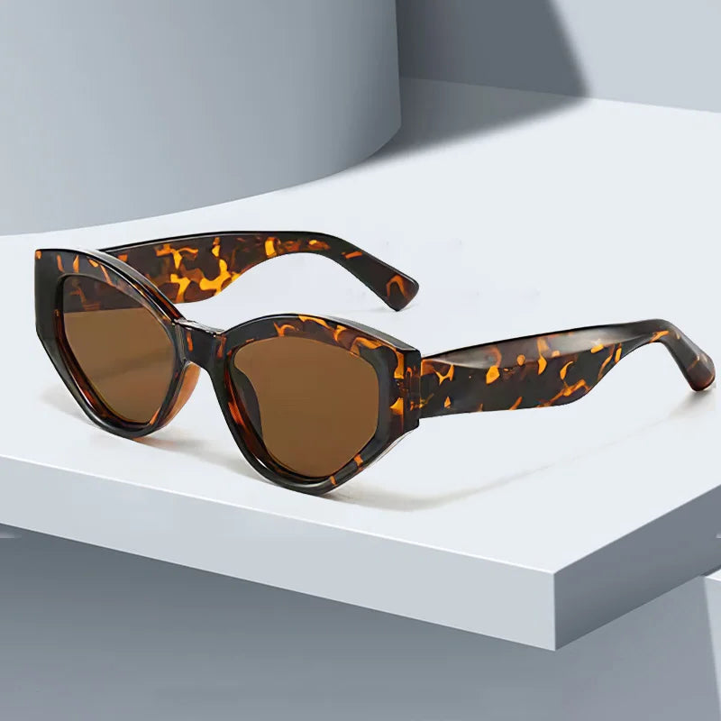 Lunettes de Soleil Sable Curve Cat Eye Acétate Brillant Protection UV400 pour un Style Audacieux