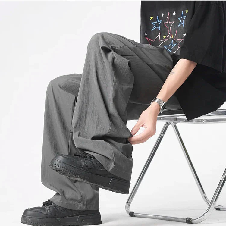 Pantalon Parachute Tufté En Nylon Léger Froissé Avec Cordons Chromés Et Coupe Large Décontractée
