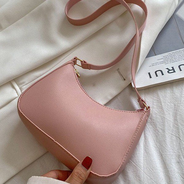 Keilira: Elegante Handtasche im Vintage-Stil
