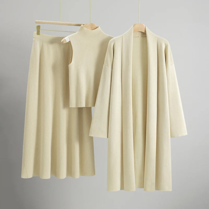 Ensemble Tricot Ambre Sofia Amoretti Trois Pièces Haut Sans Manches Jupe Coupe A Cardigan Long Fluide