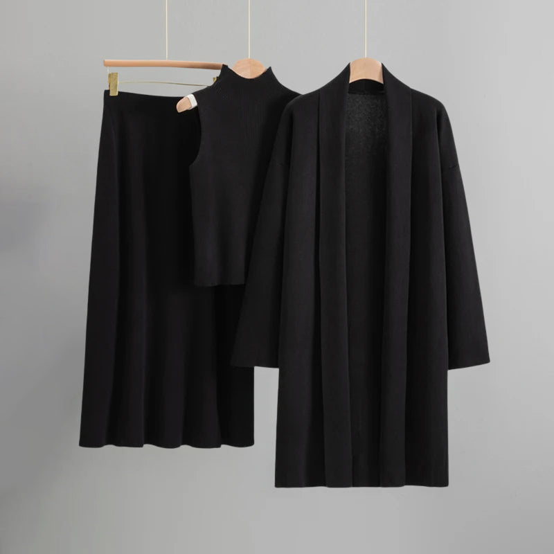 Ensemble Tricot Ambre Sofia Amoretti Trois Pièces Haut Sans Manches Jupe Coupe A Cardigan Long Fluide