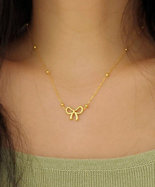 Collier élégant avec pendentif nœud en acier inoxydable doré - Amawinc