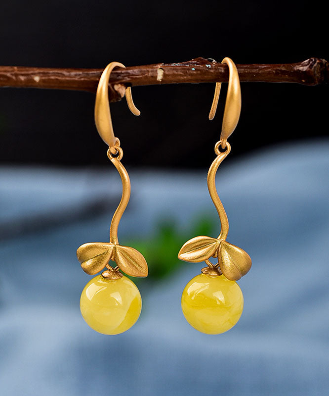 Boucles d'oreilles pendantes vintage en argent surmonté d'or et de cire d'abeille. - Amawinc