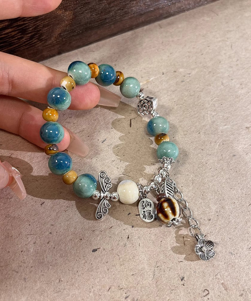 Bracelet à breloques vintage en soie, argent sterling, jade et céramique - Amawinc