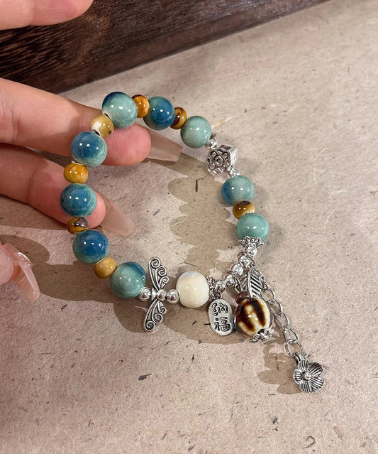 Bracelet à breloques vintage en soie, argent sterling, jade et céramique - Amawinc