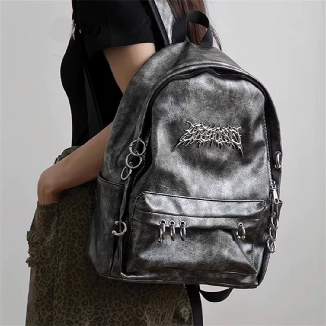 Sac À Dos Rebel Chrome Amawinc Cuir Végan Avec Cercles Métalliques Accrocheurs Et Fermetures À Glissière Sécurisées