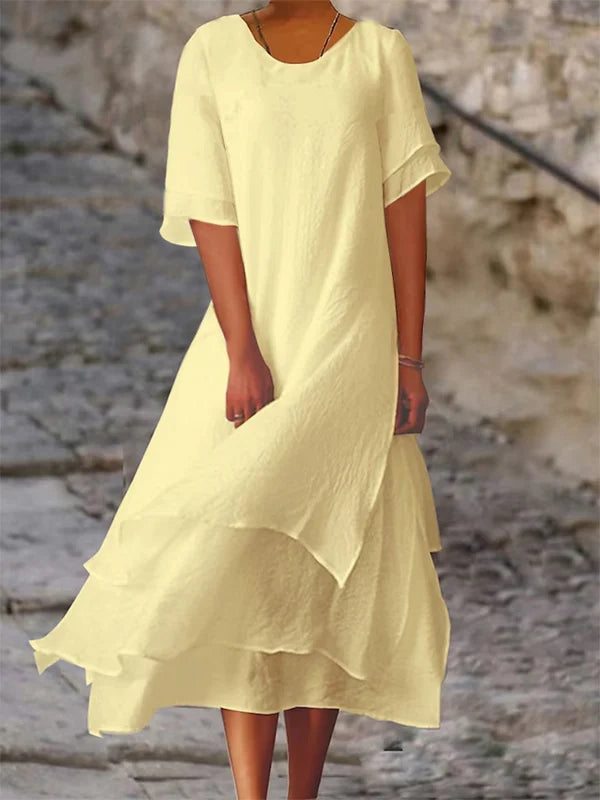 Ava Kleid: Elegantes Blockstreifen-Schlitzkleid